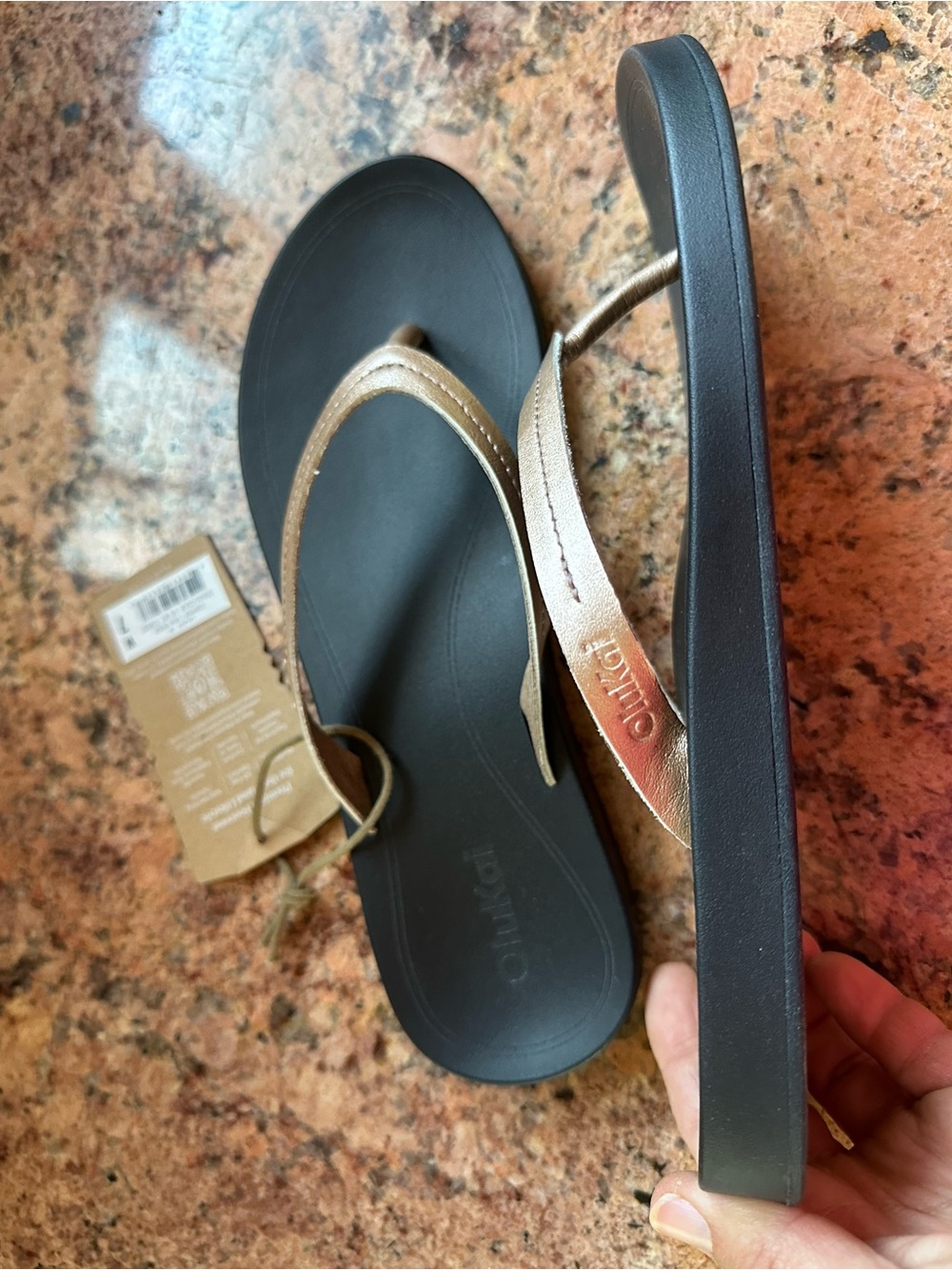 OluKai women’s rose gold leather flip flops - Picture 3 of 4